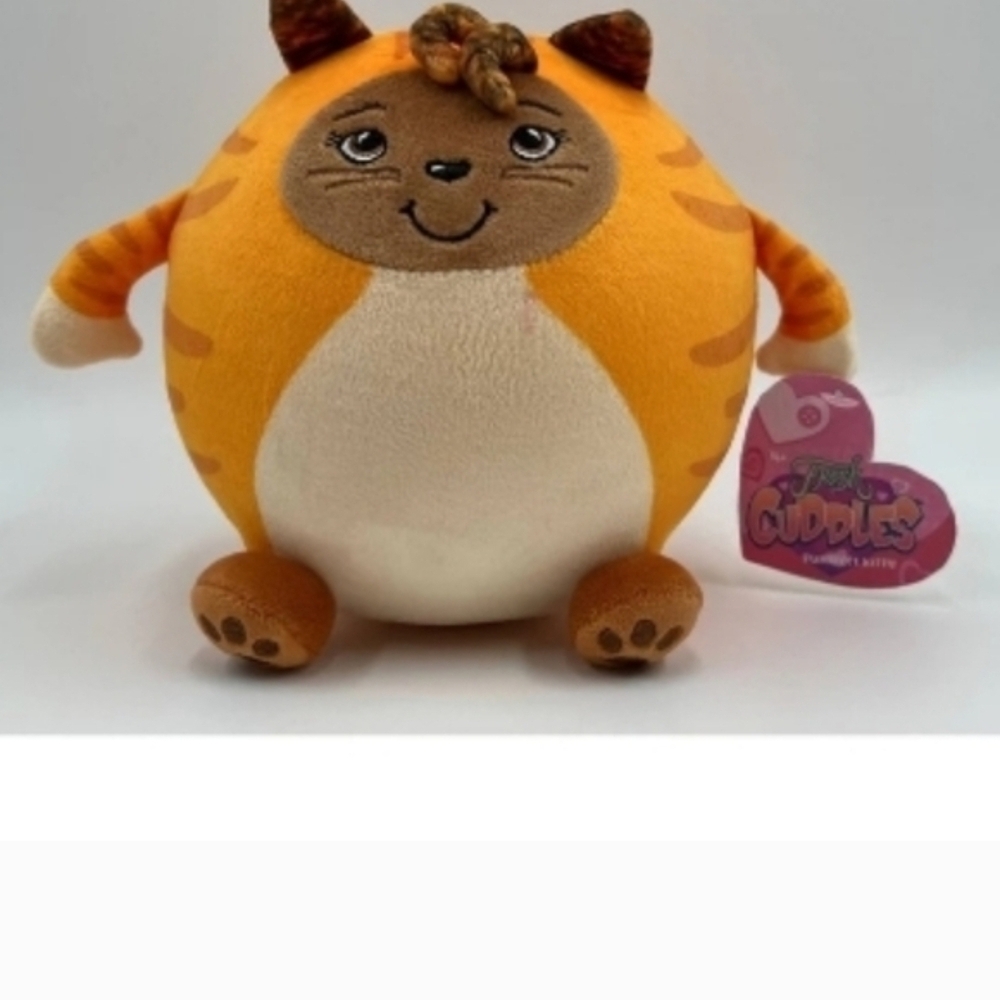 Orange and White Stuffed Animal Cat